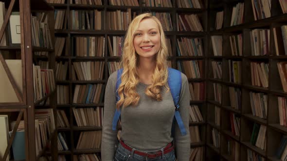 Portrait of a Young Student in the Library