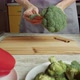Woman Cooking Broccoli on the Kitchen at Home - VideoHive Item for Sale