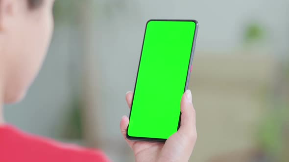 Close Up of Indian Woman Using Smartphone with Green Screen