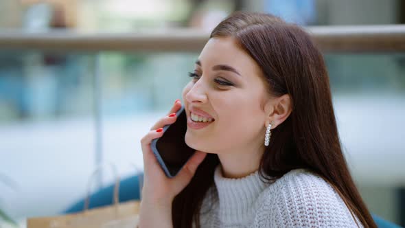 Cheerful Woman Talking on Phone