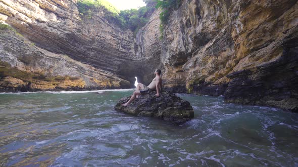 Attractive Male In A Beach Cave.