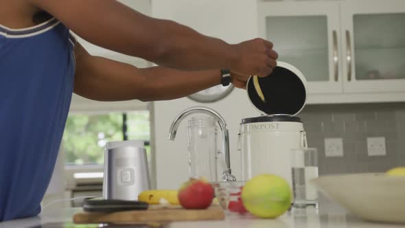 Video of african american senior man preparing smoothie