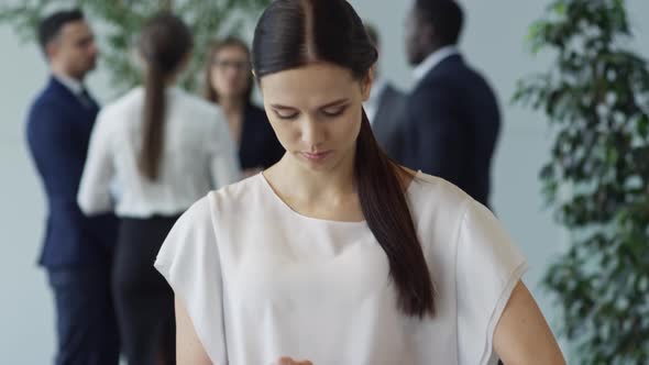 Cheerful Businesswoman Talking on Phone