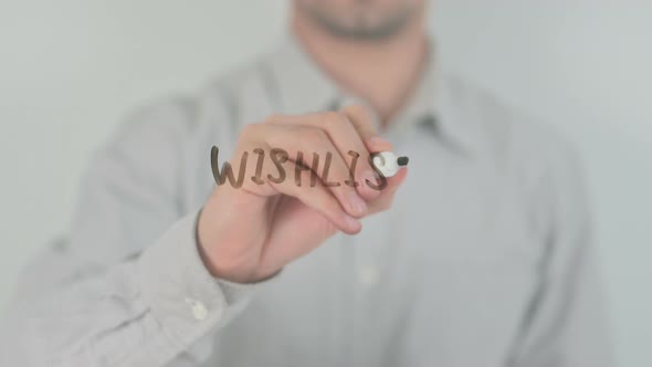 Wish List Writing on Screen with Hand