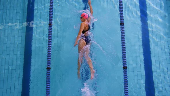 Swimmer training in a swimming pool