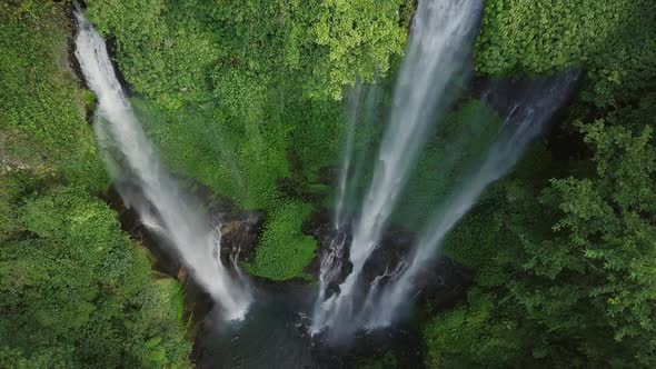 Aerial View of Waterfall in Green Rainforest