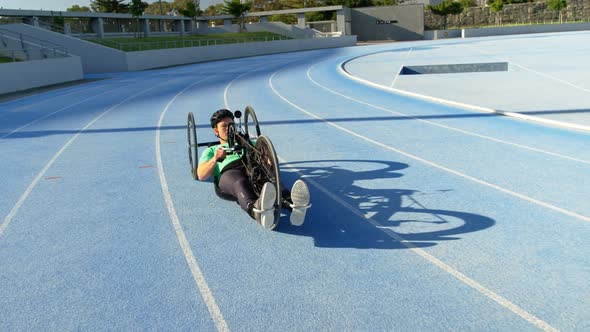 Disabled athlete racing in wheelchair 4k