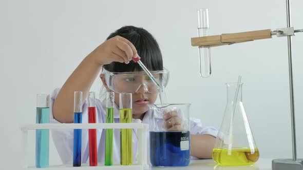 Children play and learn chemical in laboratory