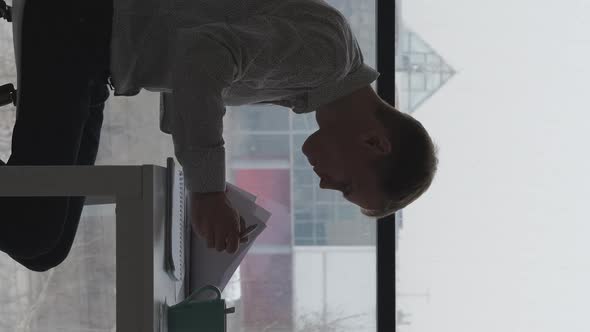 Silhouette of Male Entrepreneur Working Indoors