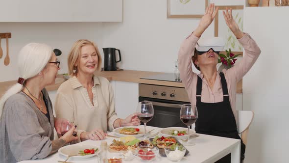 Adult Woman in VR Headset at Dinner with Friends