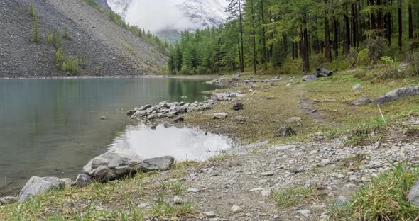 Mountain Lake Timelapse at the Summer or Autumn Time. Wild Nature and Rural Mount Valley. Green