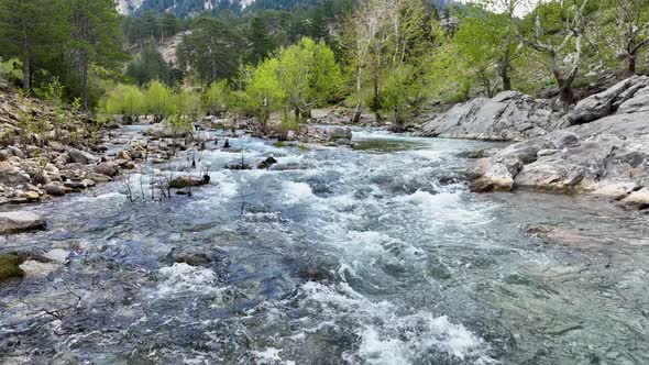 Mountain river high in the mountains aerial view 4 K