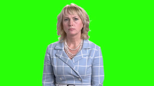 Shocked Mature Woman on Chroma Key Background