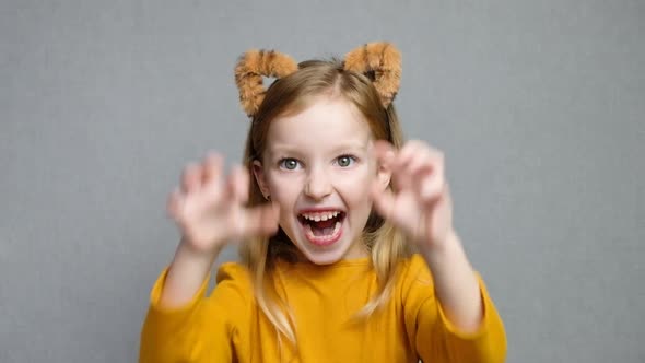 Cute Smiling Blond Girl with Tiger Ears