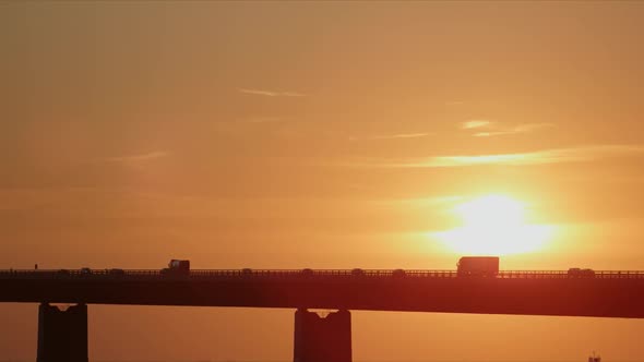 Golden Sunset Along the Great Belt Bridge in Denmark