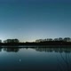 Night sky Video Footage - Timelapse Of Night Sky Over Lake - VideoHive Item for Sale