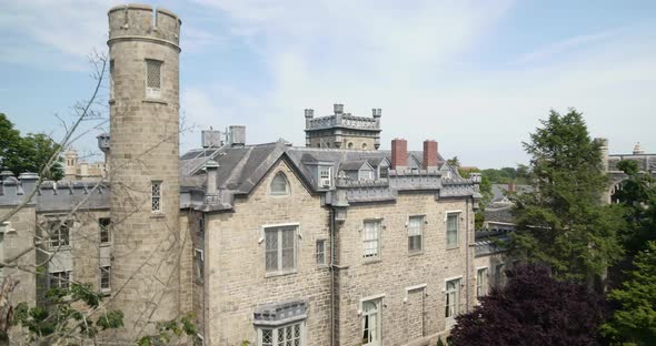 Rising Aerial Shot of a Castle With Gothic Revival Architecture