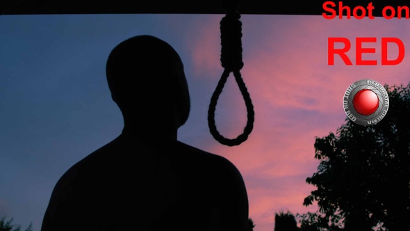 Man Trying To Commit Suicide By Hanging Himself On A Hangman Rope