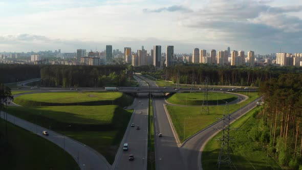 Aerial View of a Busy Motorway Interchange with a Lot of Traffic