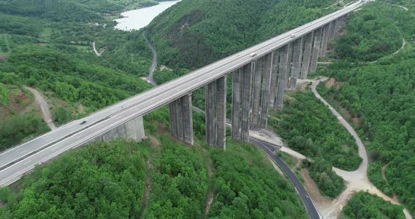 Aerial view of highway and beautiful natural landscape. Mountain bridge.