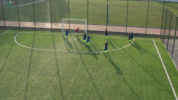 Young Soccer Players Working Out Corner Kick