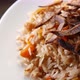 Uzbek Plov or Pilaf on a White Plate  Food of Central Asia - VideoHive Item for Sale