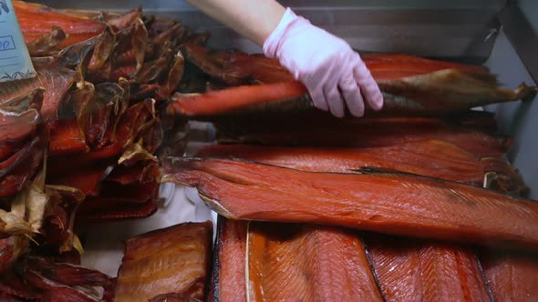 Showing Smoked Salted Red Salmon on Counter at Fish Market