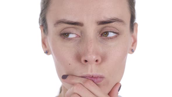 Close Up of Middle Aged Thinking Woman Face Gesturing Brainstorming