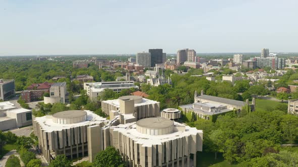 Cinematic Drone Flight Above Buildings near Downtown Evanston, IL on Hot Summer Day