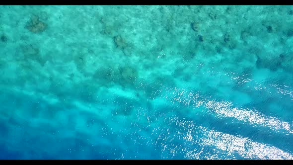 Aerial view nature of luxury resort beach trip by aqua blue lagoon with white sandy background of a 