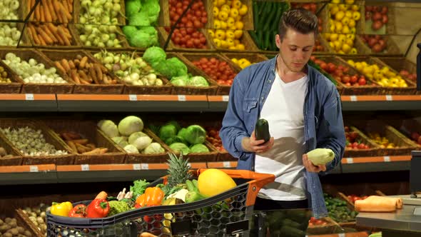 Guy Chooses Marrow at the Supermarket