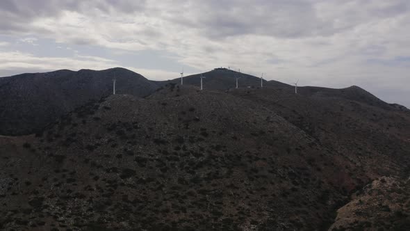 Aerial view of  Wind turbine Plant in mountain. Renewable green energy 