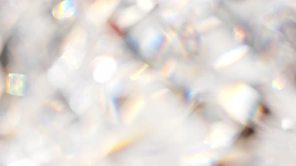 Shining crystal diamond light optical refraction. Sparkling blurred highlights