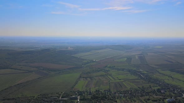 Aerial panorama in mountains rural scenery of countryside at wonderful springtime landscape