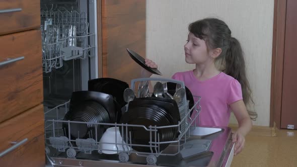 Unload dishes in the kitchen. 