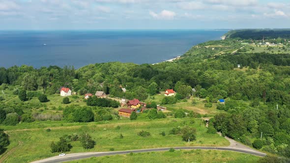 Baltic Coastline with Green Summer Forest and the Sea