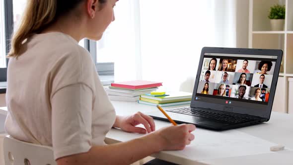 Woman with Laptop Drawing and Having Video Call