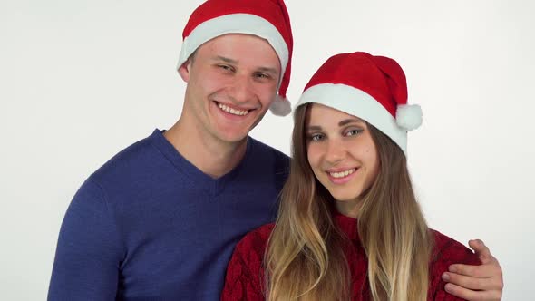 Happy Handsome Man Giving Christmas Present To His Beautiful Girlfriend 1080p