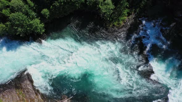 Ice cold glacier river from melting Jostedal glacier during summer in Norway - Clean turquoise and g