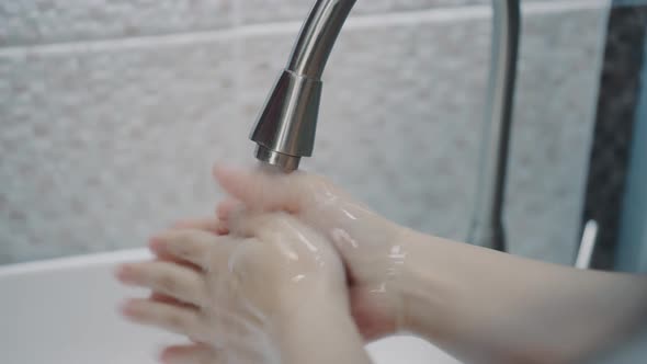 Washing Hands With Soapy Water