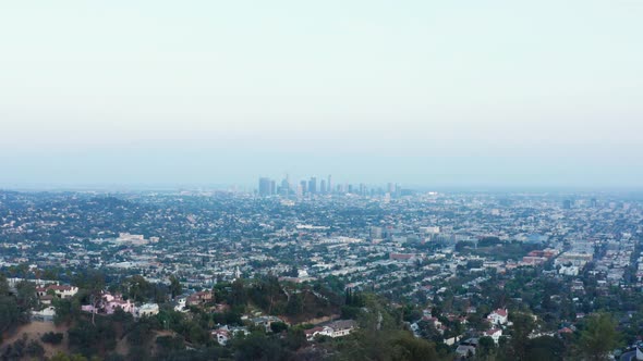 Urban aerial view of beautiful and scenic downtown Los Angeles on blue sky.