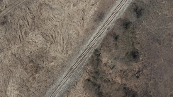 Abandoned railroad track in the field 4K drone footage