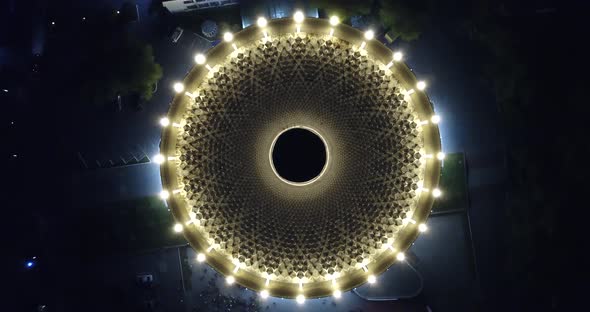 Round Roof of The Building. Drone Footage. the View from The Top. Looks Like a Wheel, a Black Hole