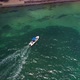Boat Docking In Caribbean Ocean Beach Aerial Drone Shot - VideoHive Item for Sale