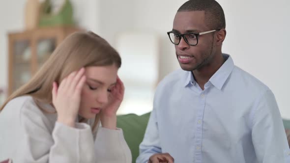 Angry African Man Fighting with Caucasian Woman at Home Couple