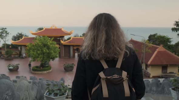 Tourist Woman is Visiting Truc Lam Ho Quoc Zen Monastery in Vietnam