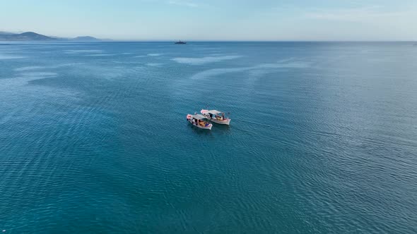 Fishing boat goeas to sea aerial view Turkey Alanya 4 K