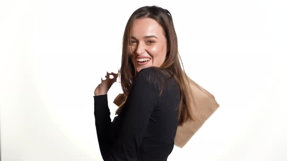 Young Woman Holding a Shopping Bag