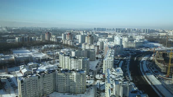 City quarters. Multi-story houses. Winter cityscape.