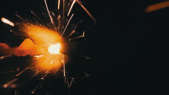 Lightening Sparkler on Black Background in Slow Motion Macro Shot